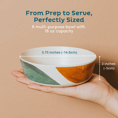 Nook Theory toddler-hand-size bamboo bowls support little hands during meals.