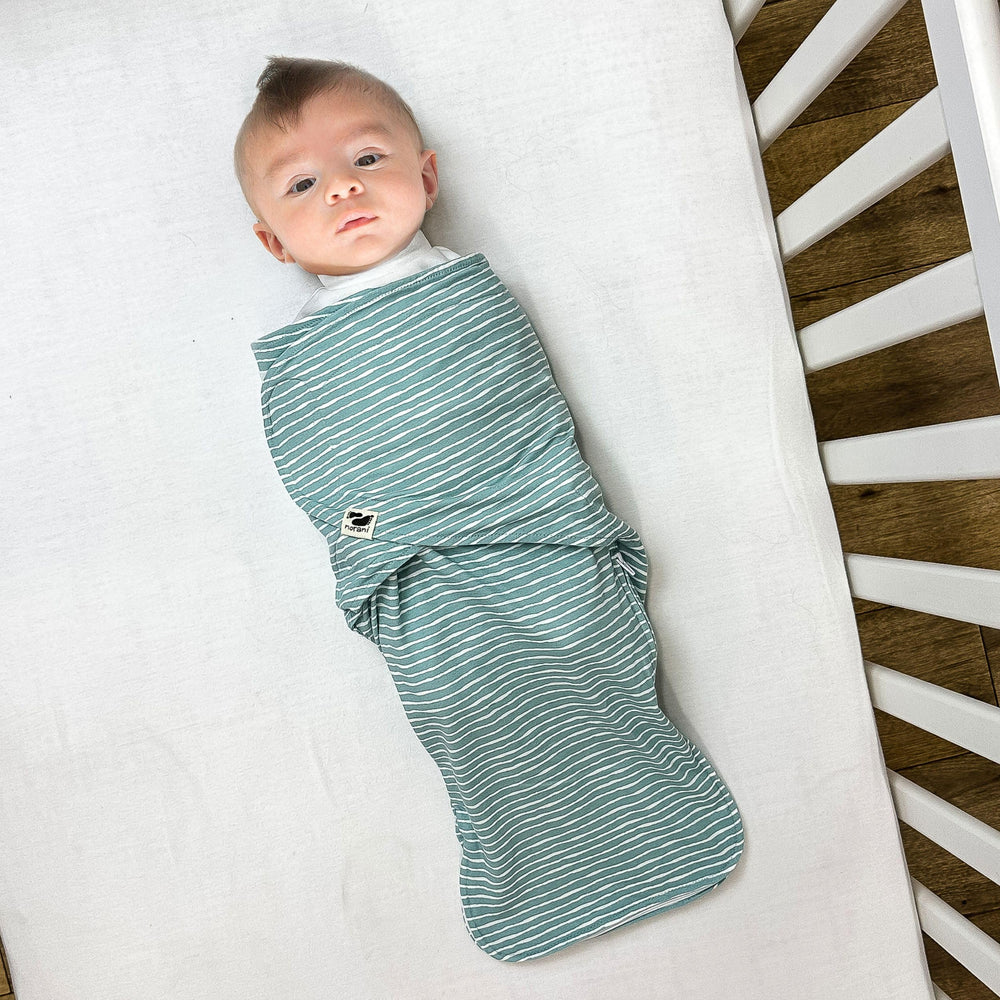 Norani Snugababe Swaddle Pod supports hip-friendly positioning for healthy development.