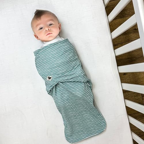 Norani Snugababe Swaddle Pod secures arms with inserts for secure, cozy swaddling.