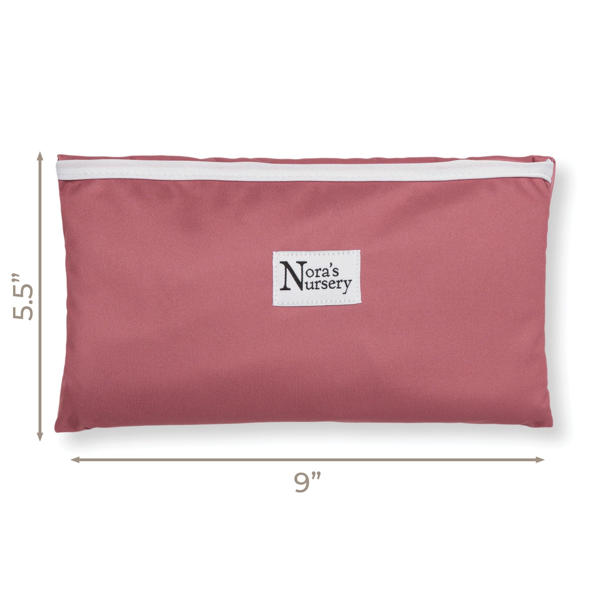Nora's Nursery dual-sided pad showing waterproof and bamboo absorbent surfaces