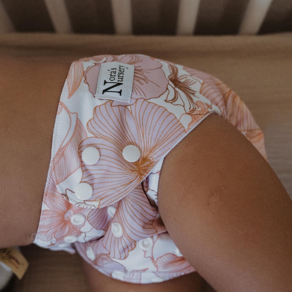 Nora's Nursery washable liner for stain protection and easy cleanup.