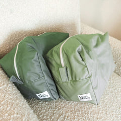 Nora's Nursery diaper pod size 11x6x7 fits seven to eight diapers or covers.