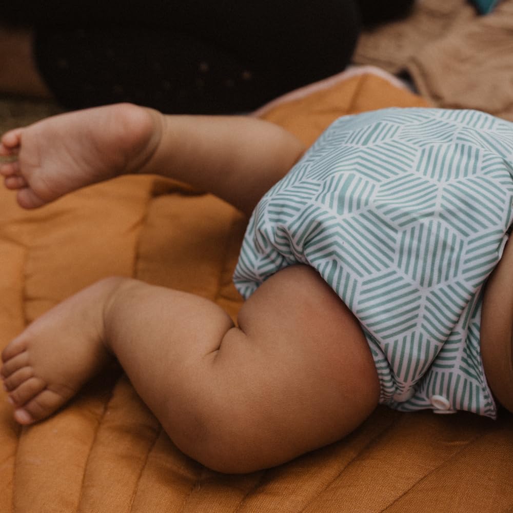Nora's Nursery reusable diaper set supports eco-friendly routines.