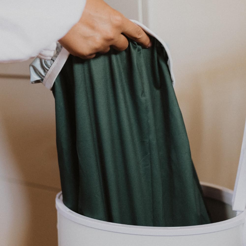 Nora's Nursery forest liner resists stains for easy laundry day cleanup.