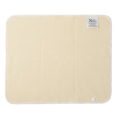 Nora's Nursery hemp prefold snap insert attached to diaper cover with snaps.