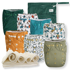 Nora's Nursery outer-space pocket diaper set shown, versatile for day and night use.