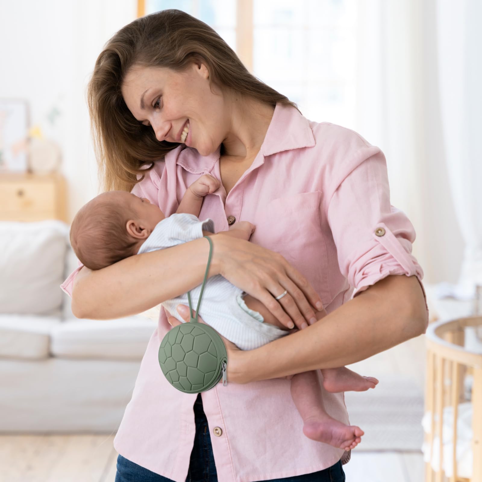 Nothomme silicone pacifier holder stores teethers and snacks safely.