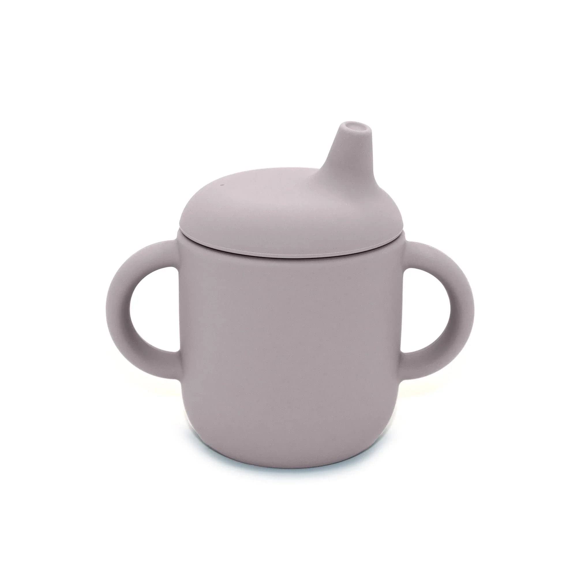 Noüka non-spill sippy cup with secure grip for mess-free drinking.