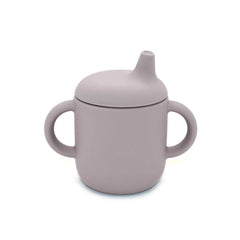 Noüka non-spill sippy cup with secure grip for mess-free drinking.