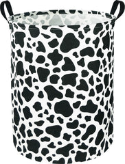NTAOHAMPER Cow Laundry Basket with sturdy handles for easy transport and room decor.