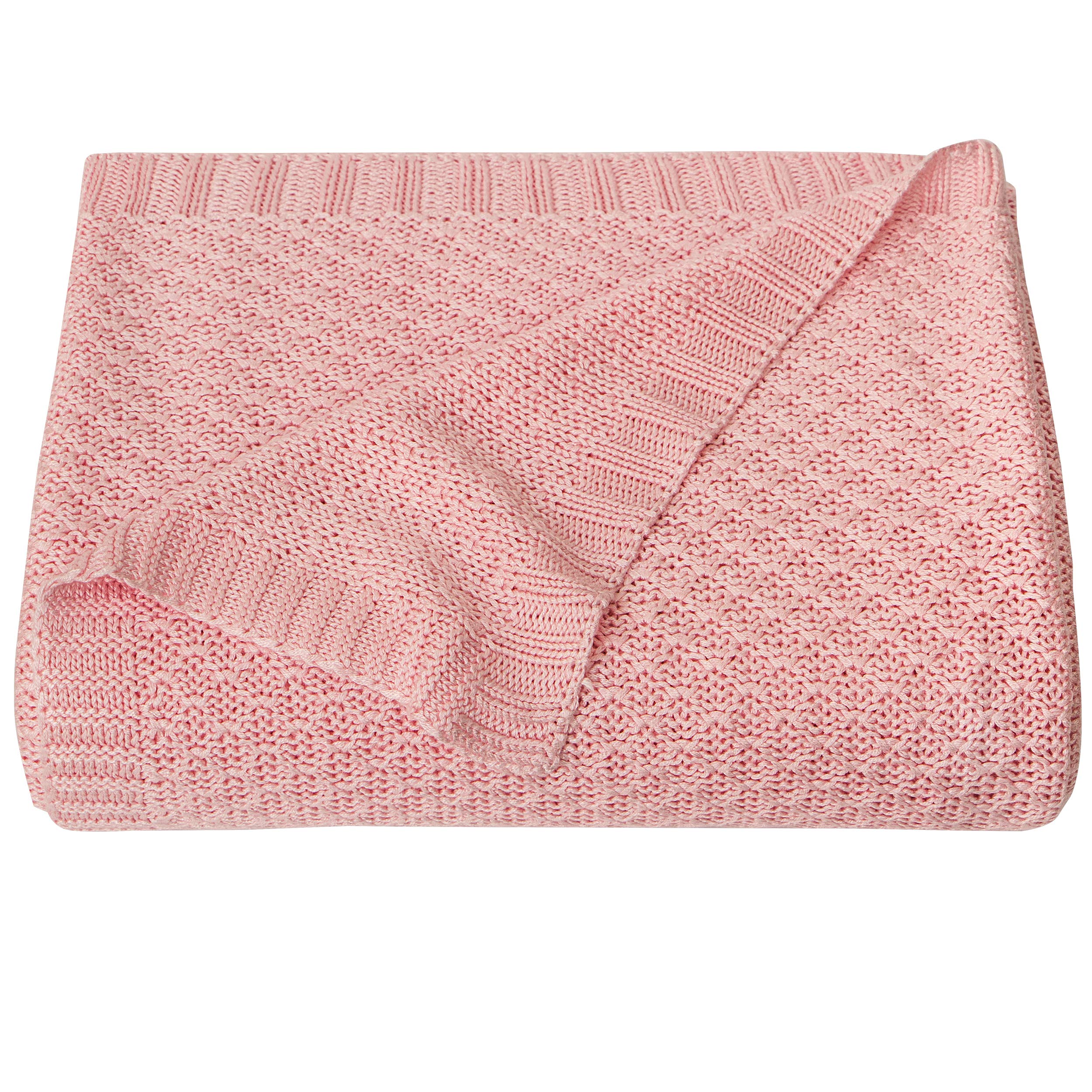 NTBAY cable-knit cooling blanket pink draped in crib for breathable comfort.