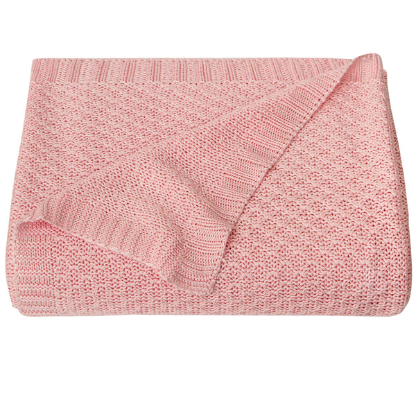 NTBAY cable-knit cooling blanket pink draped in crib for breathable comfort.