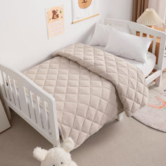 NTBAY taupe comforter demonstrates neutral nursery styling.