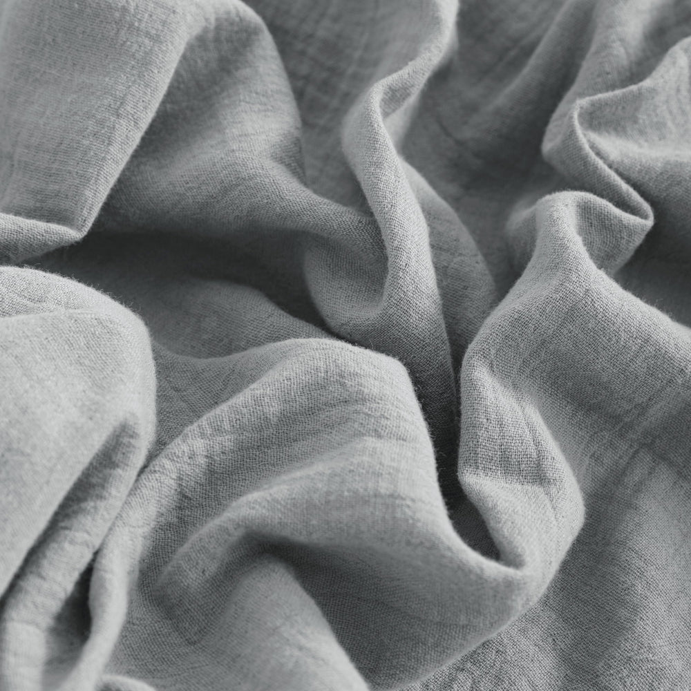 Fitted crib sheet with 360-degree elastic from NTBAY stays secure on standard cribs.