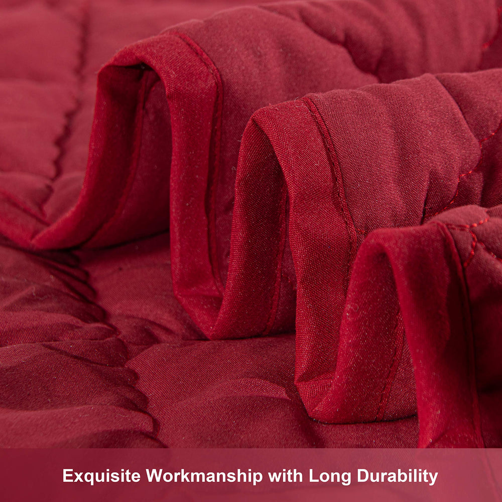 NTBAY Down Alternative Toddler Comforter red folded closeup shows cozy quilted texture.