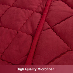 NTBAY Down Alternative Toddler Comforter red side view highlights plush warmth and easy care.