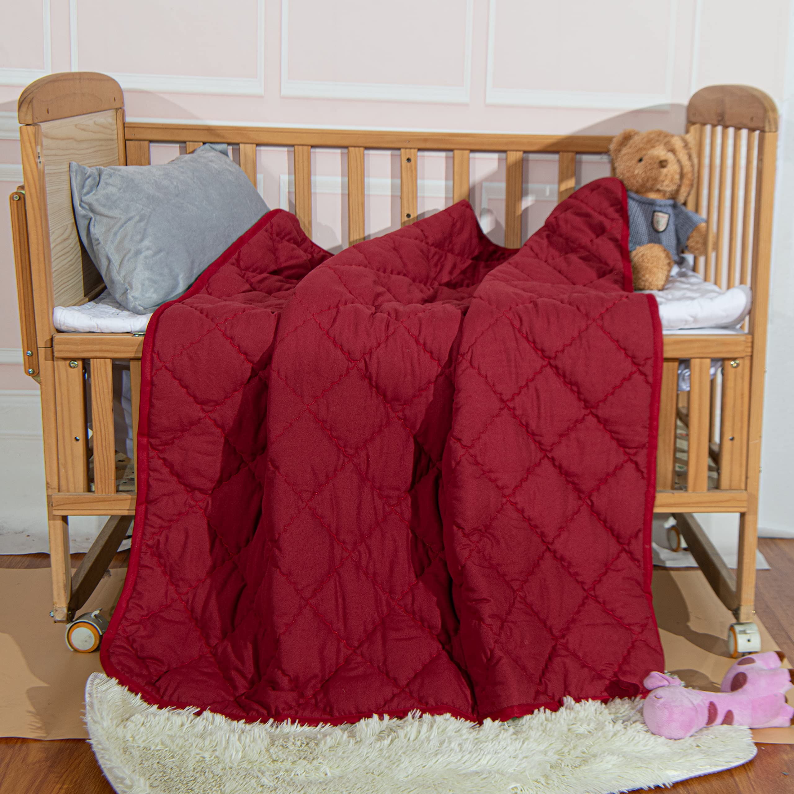 NTBAY Down Alternative Toddler Comforter red stitch-detail image showcases durable quilting.