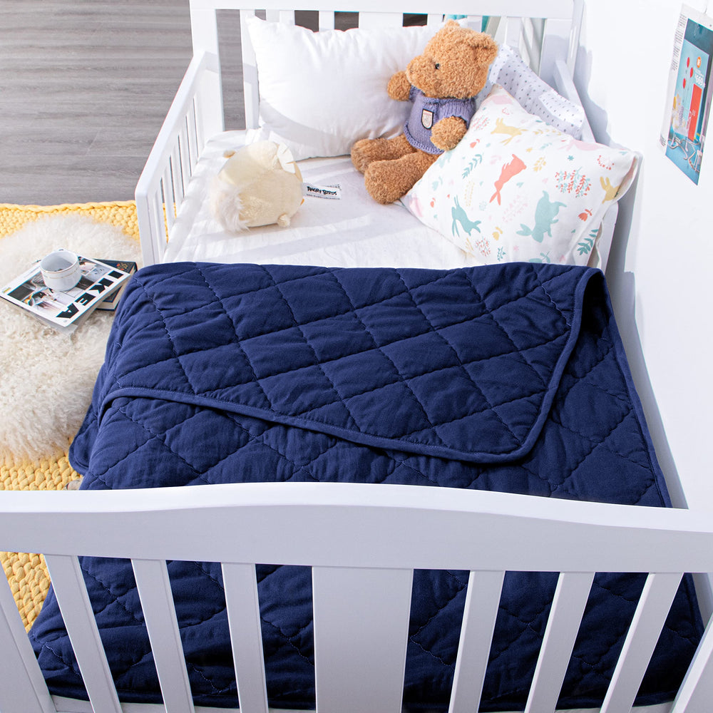 NTBAY navy quilt gift-ready packaging accentuates thoughtful baby gift.