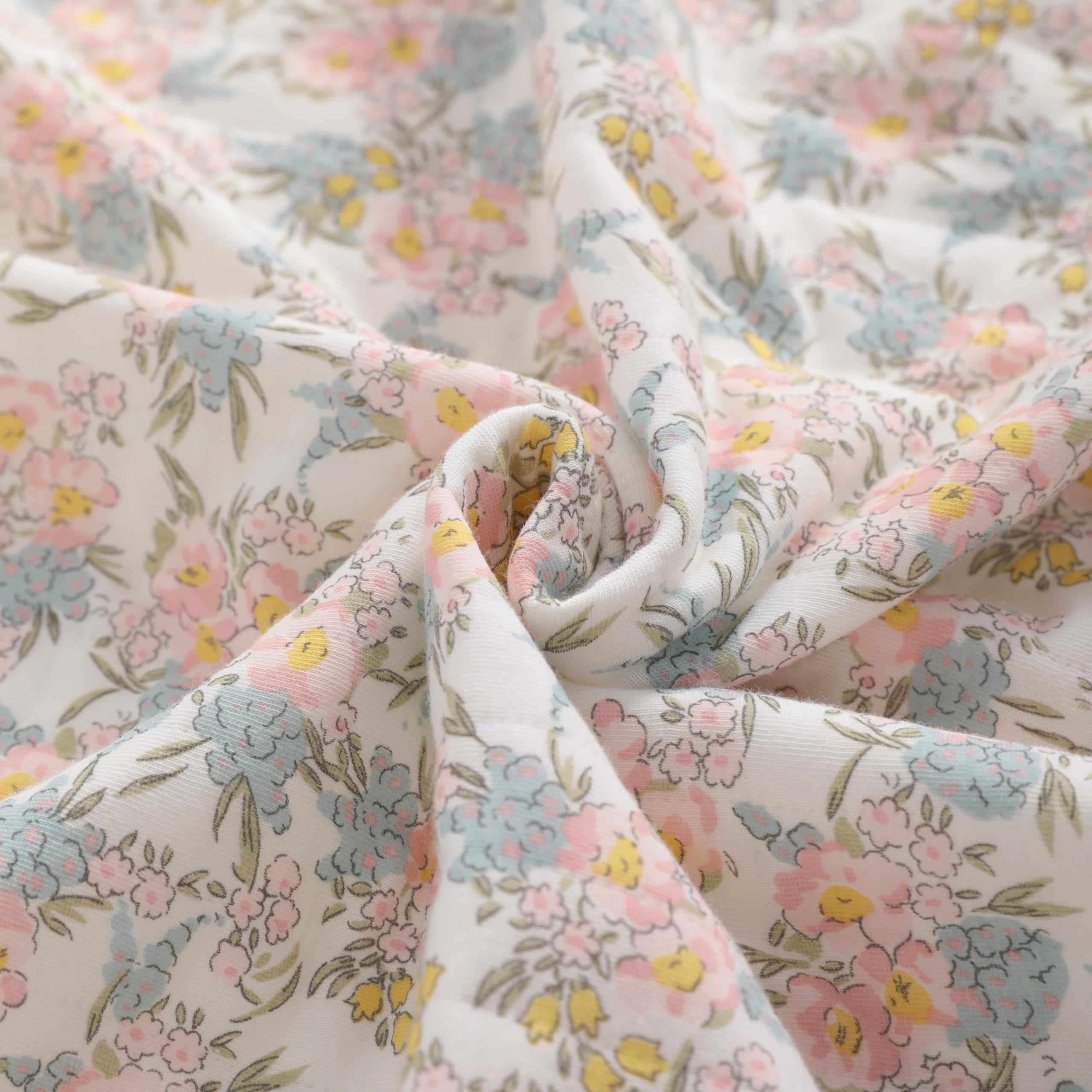 NTBAY Jersey Cotton Quilted Toddler Blanket pink floral folded to highlight size and warmth