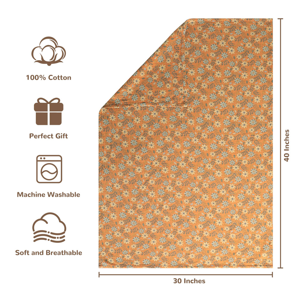 NTBAY muslin blanket laid on crib highlighting lightweight warmth for newborn sleep