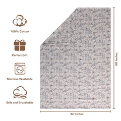 NTBAY muslin blanket with reversible pattern offers versatile styling for babies.