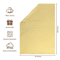 NTBAY muslin cotton blanket on crib shows reversible patterns for versatile naps.