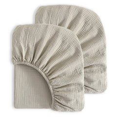 NTBAY muslin crib sheets folded view, soft breathable fabric for cozy naps