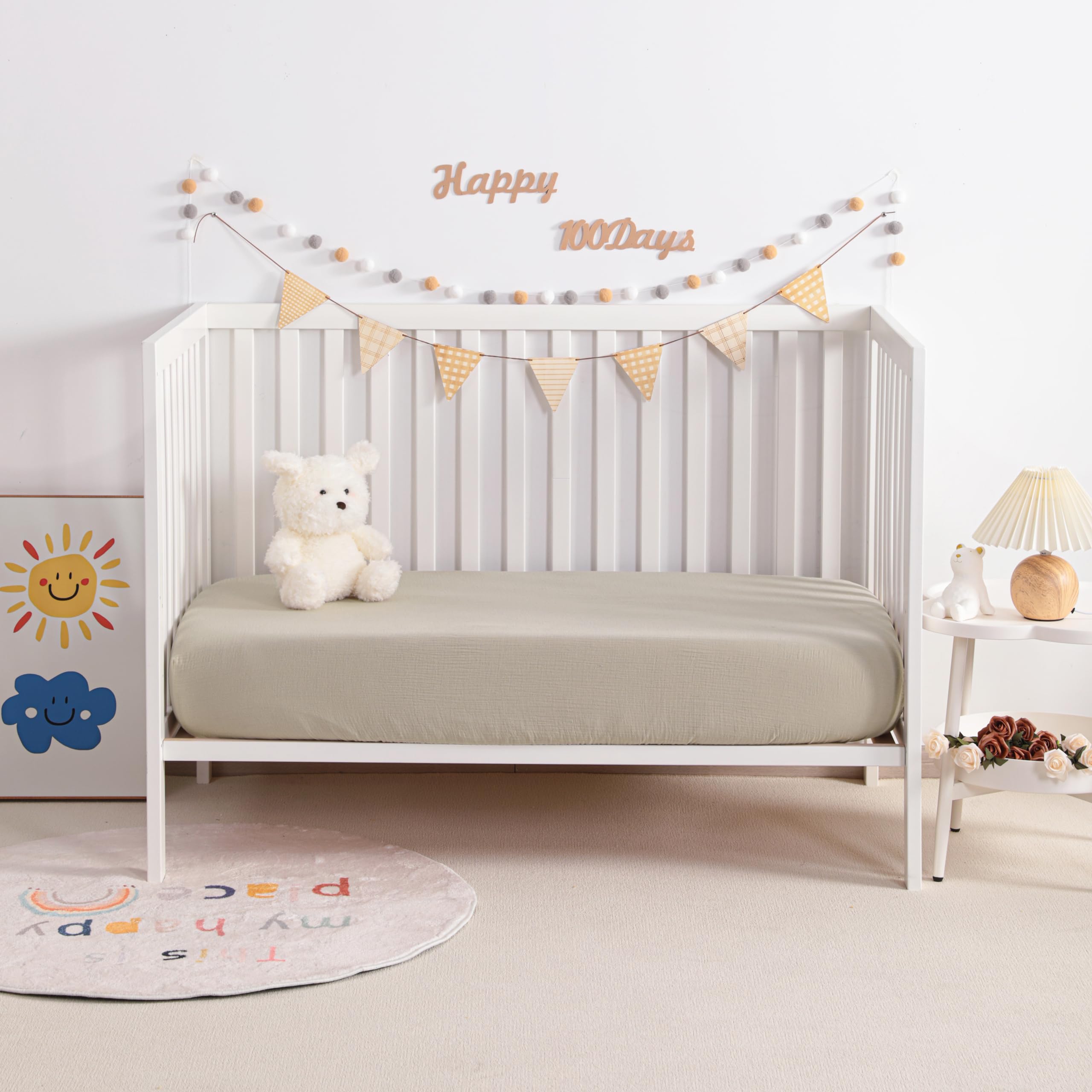NTBAY muslin crib sheets on mattress with snug fit and elastic edge