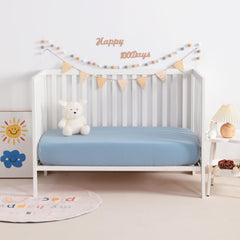 NTBAY muslin crib sheets feel soft and breathable for peaceful sleep.