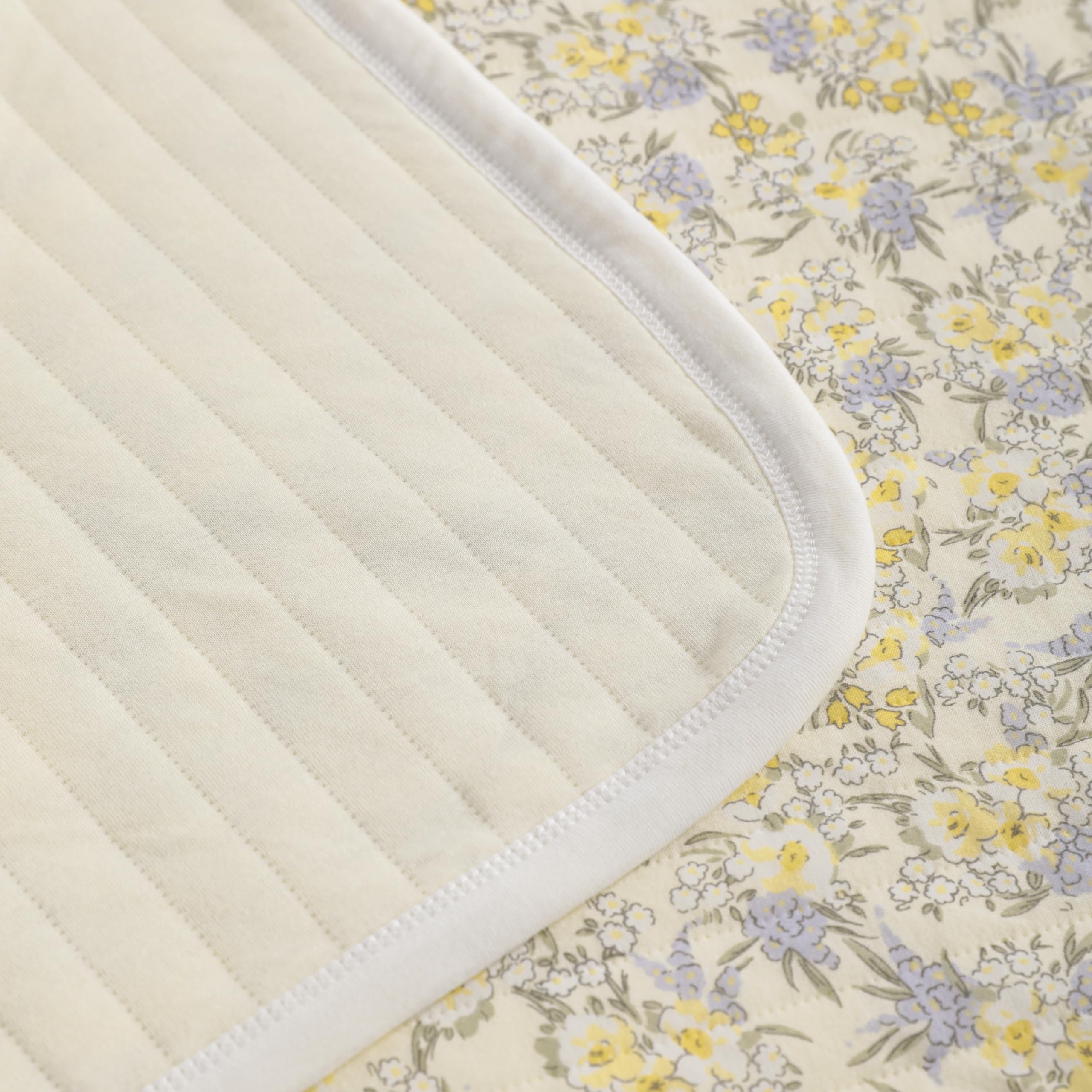 NTBAY nursery blanket used as stroller cover