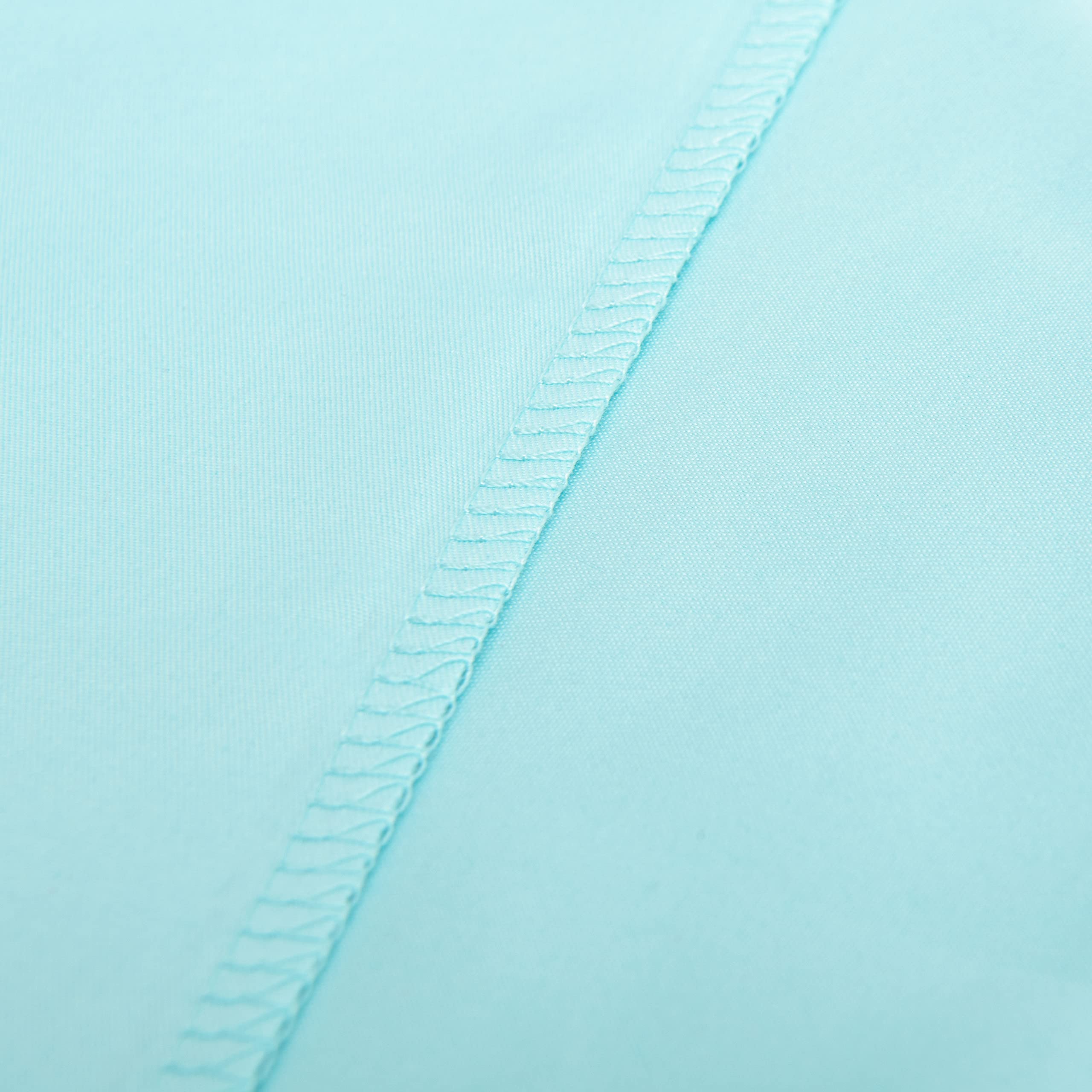 NTBAY aqua pillowcase texture close-up highlights softness for naps.