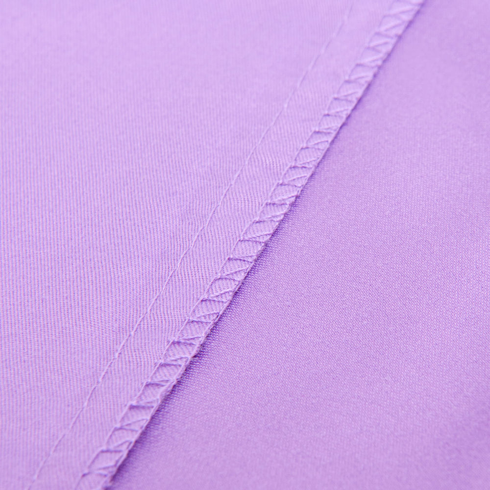 NTBAY 4pc flat sheet close-up highlighting breathable, gentle touch.