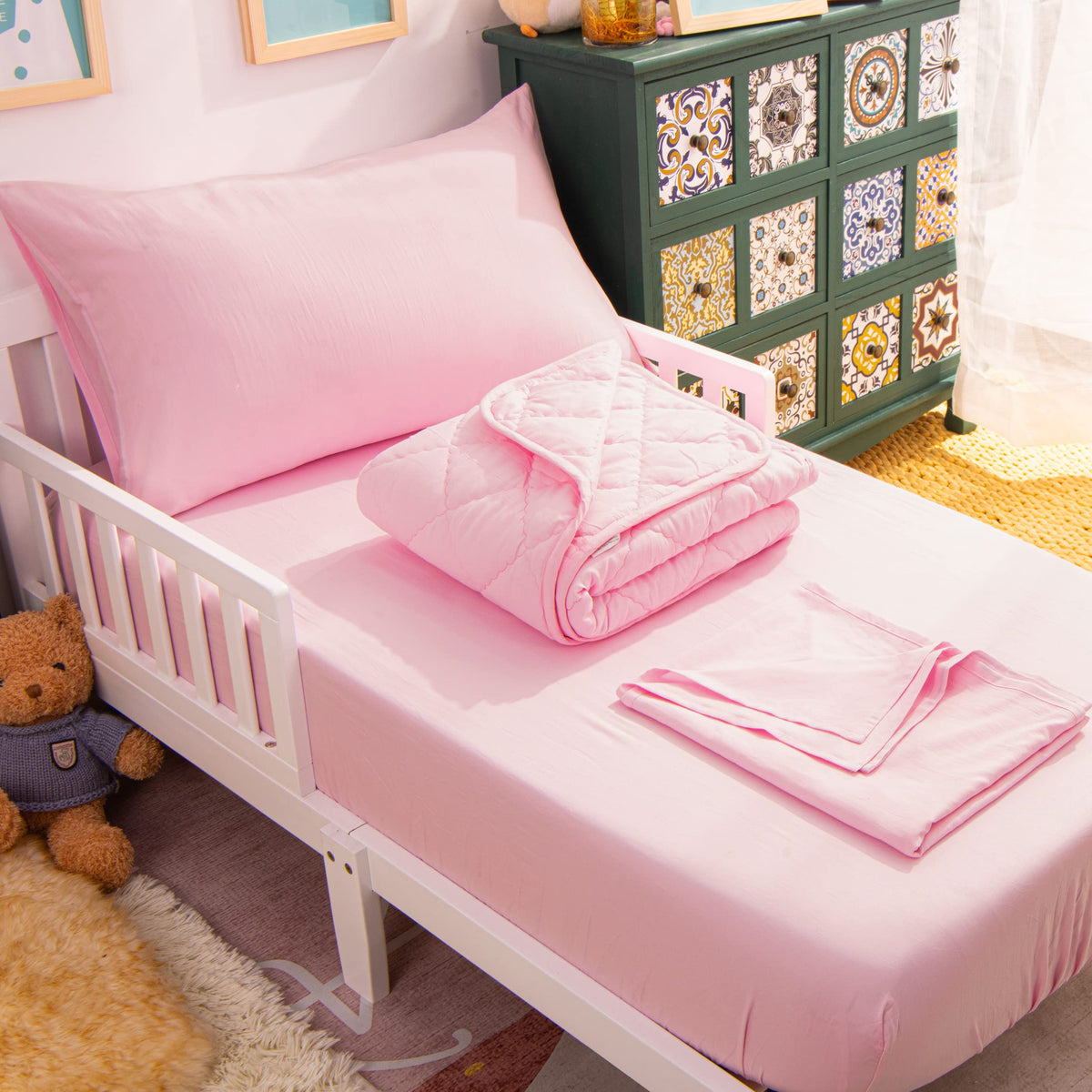 NTBAY Toddler Bedding Set quilted pink comforter for cozy bedtime warmth.