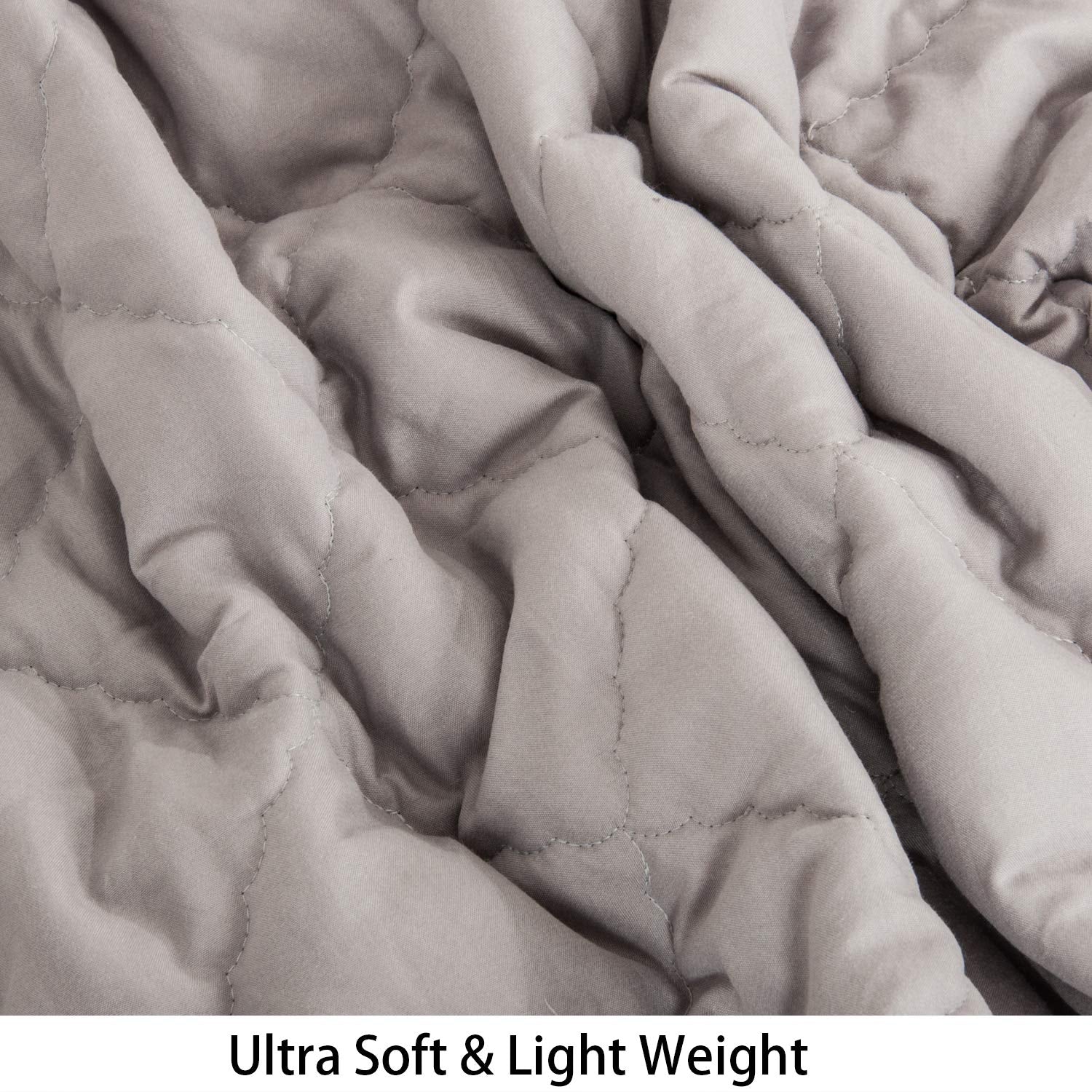 NTBAY down alternative comforter on crib scene for neutral nursery aesthetics.