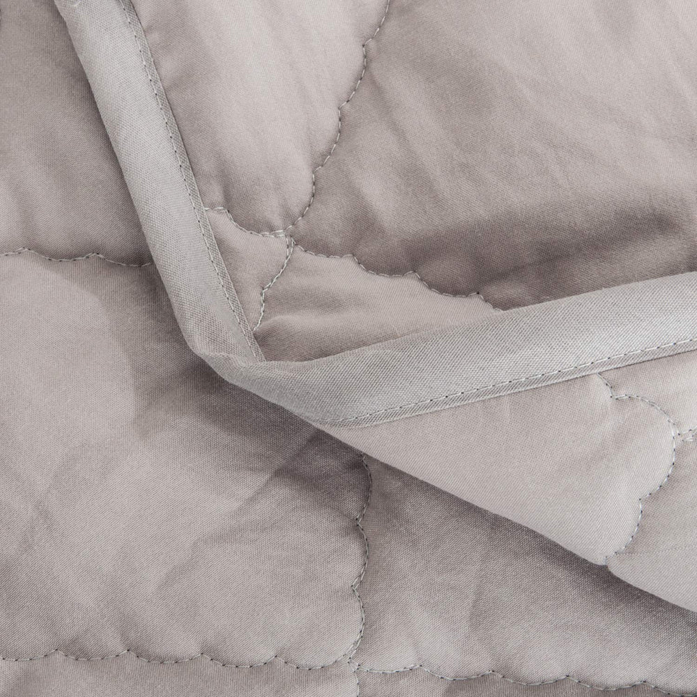 NTBAY toddler comforter smoke grey folded showing compact storage and soft loft.