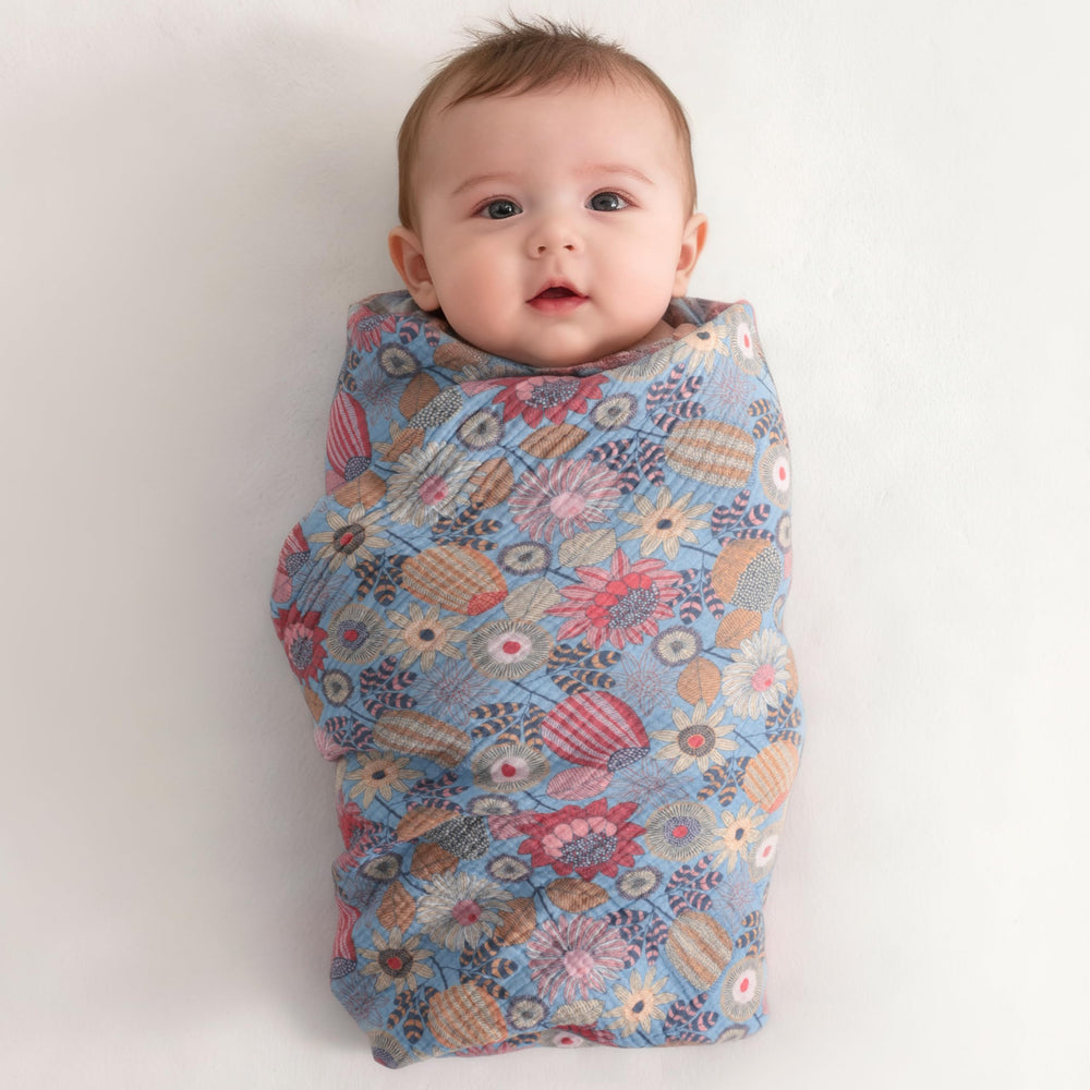 NTBAY travel-friendly blanket doubles as nursing cover for outings.