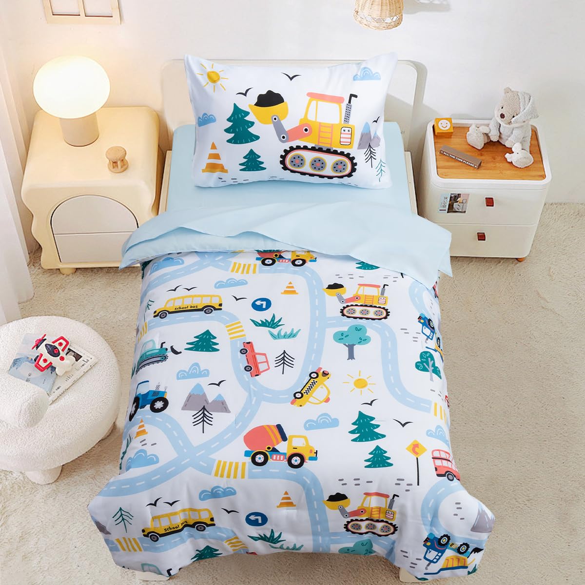 NTBED toddler bedding set with under-construction trucks in light blue.