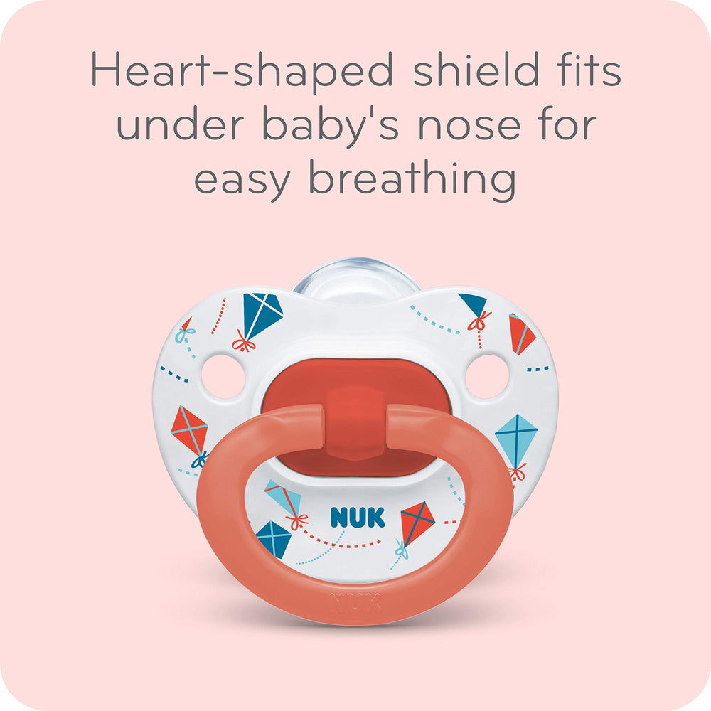 NUK Disney Mickey pacifier shield close-up, heart-shaped shield aids breathing comfort.