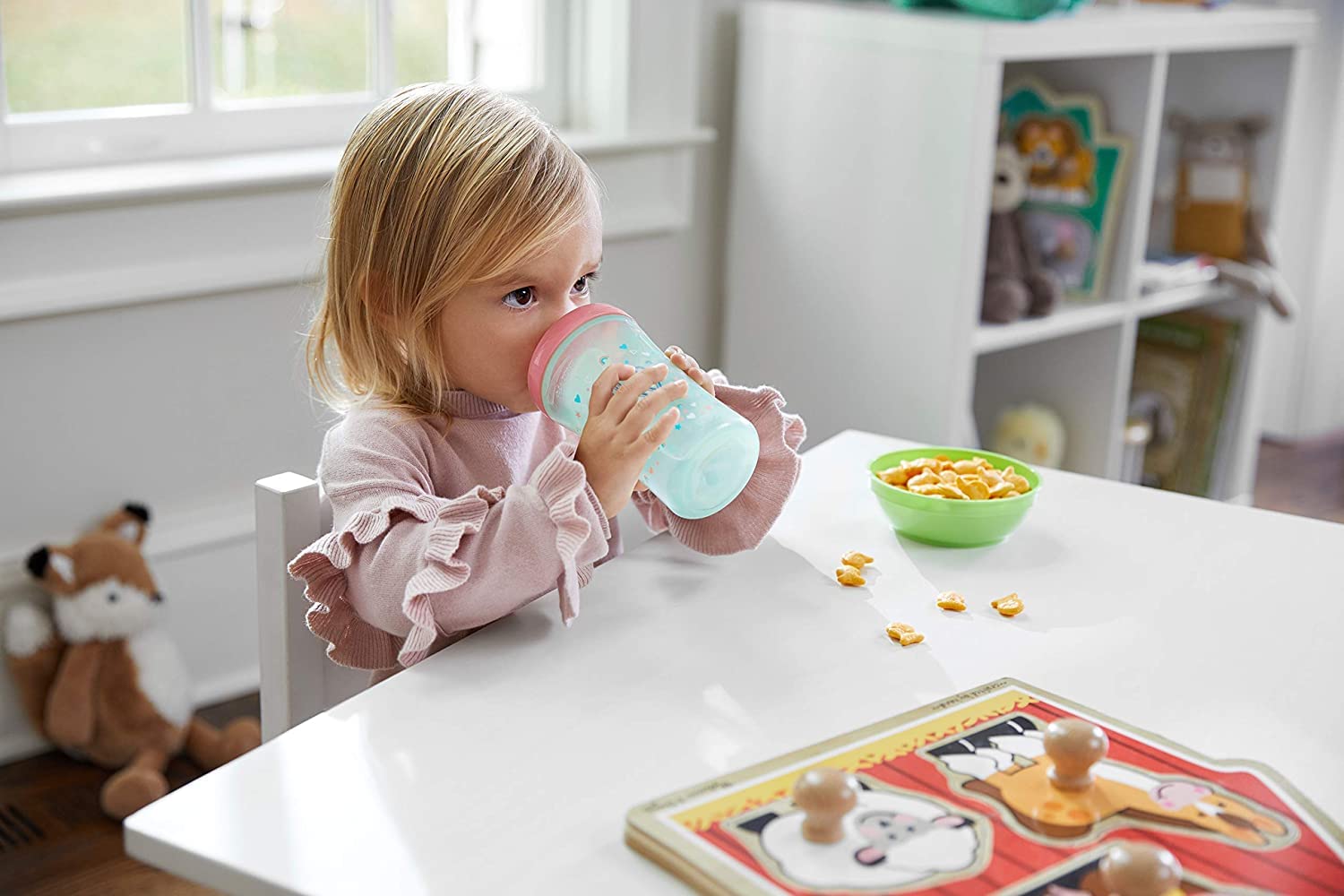 NUK ergonomic handle makes gripping comfortable for small hands.