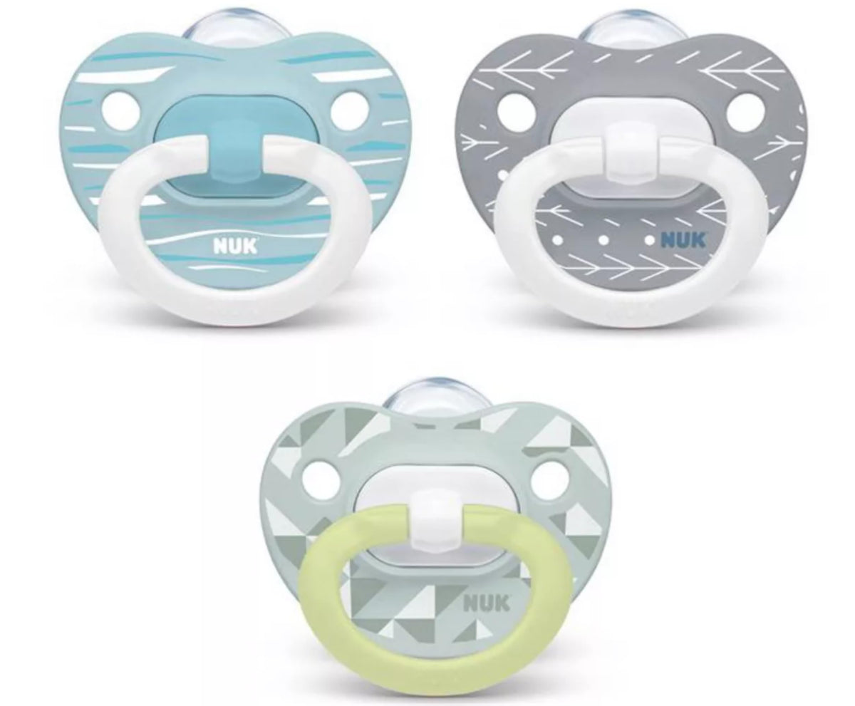NUK orthodontic pacifier glows in the dark for easy night-time finding.