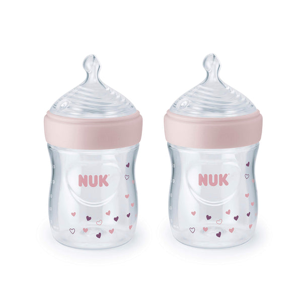 NUK Simply Natural 5 oz bottle with pink hearts offers comfortable grip.