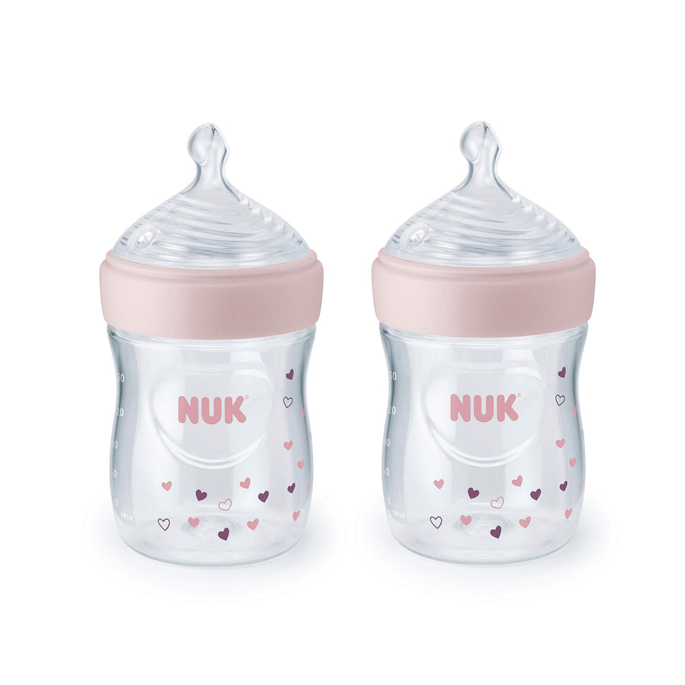 NUK Simply Natural 5 oz bottle with pink hearts offers comfortable grip.