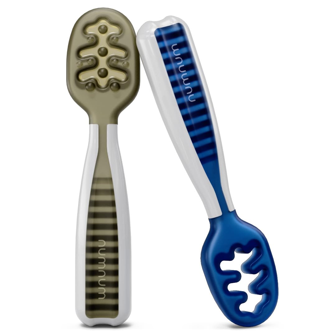 NumNum olive pre-spoon spoon in hand for easy self-feeding.