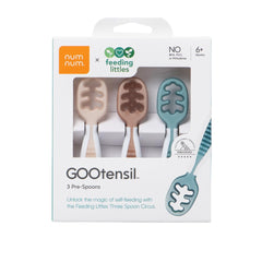 NumNum GOOtensils stage-one teether spoon easing gums and starting self-feeding.