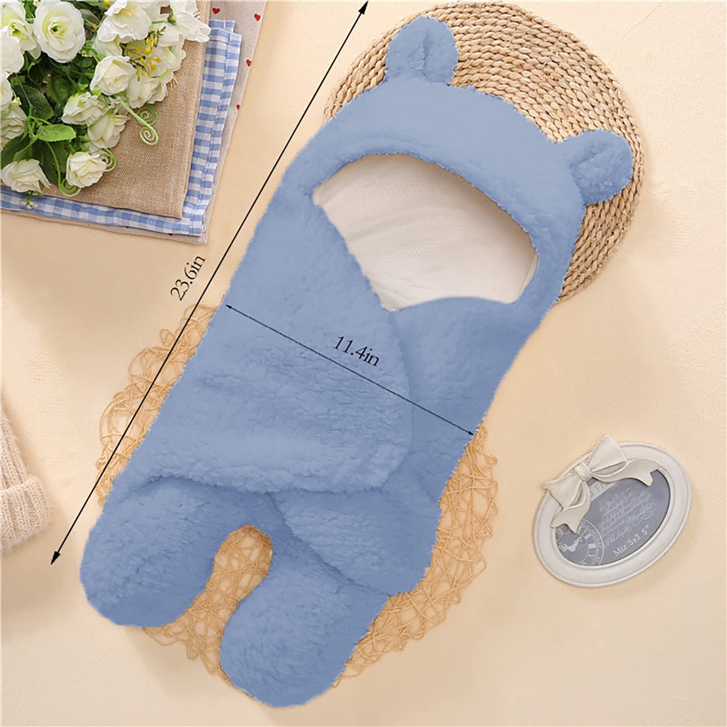 Nunibum adjustable wings velcro blue swaddle for a secure, easy wrap.