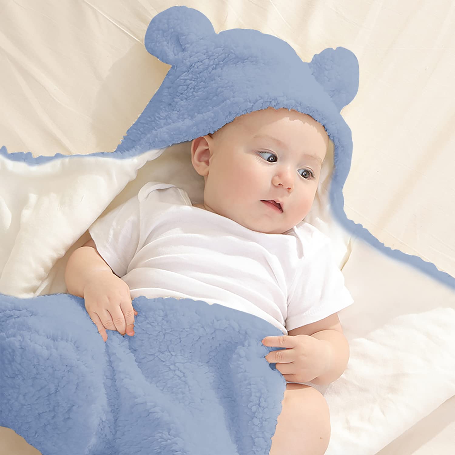 Nunibum universal-fit blue swaddle suits most newborns.