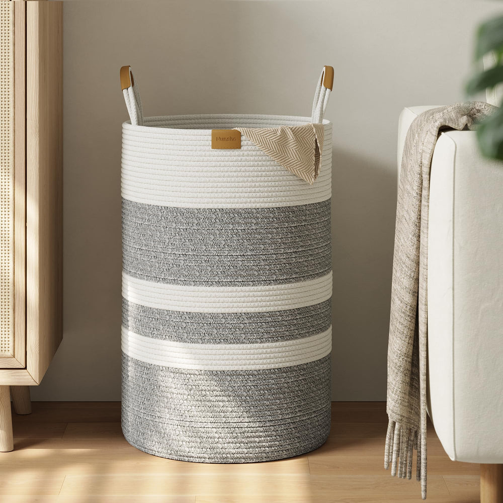 Nunsino 75L striped laundry hamper with leather handles for easy transport.