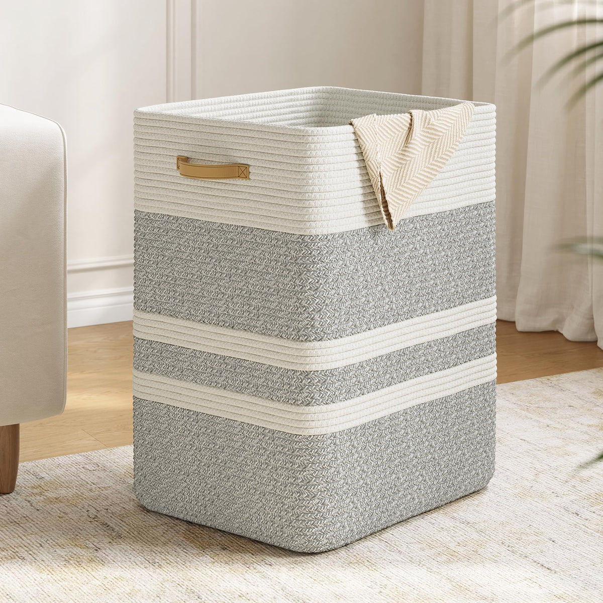 Nunsino 87L laundry hamper with leather handles for sturdy storage.