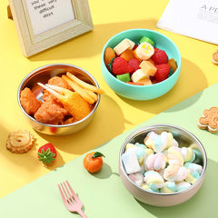 Nuogo stainless steel bowls with removable silicone shell in green for easy grip.