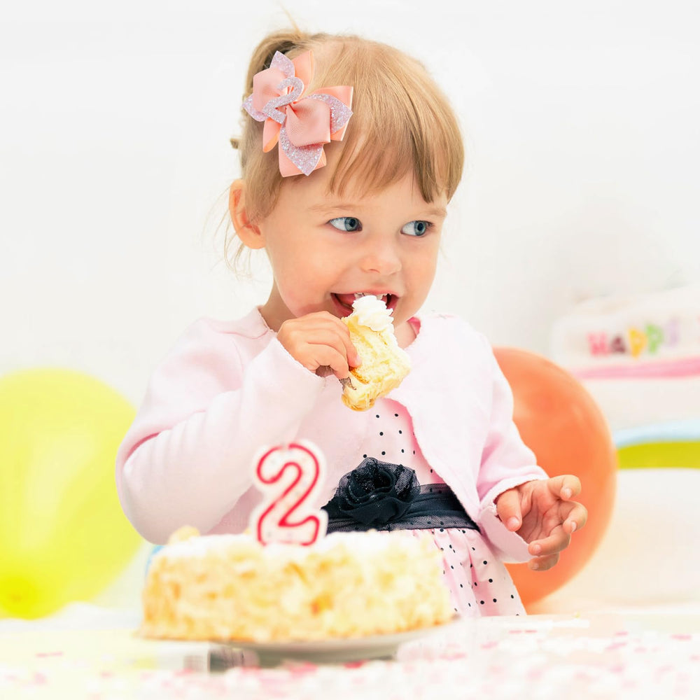 Nuolich birthday bow as a gift idea pairs with birthday outfits and decorations.
